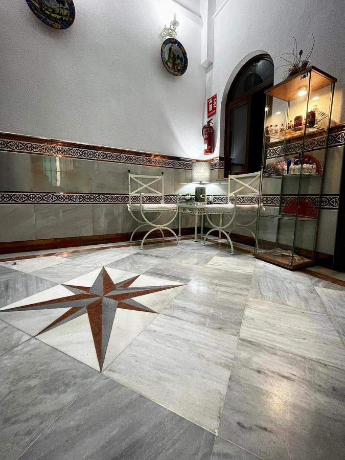 Hostal Paco'S Séville Extérieur photo Marble floor